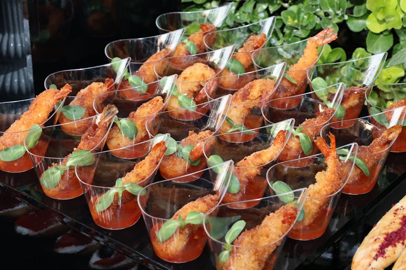 Deep dish pizza served at a catering event